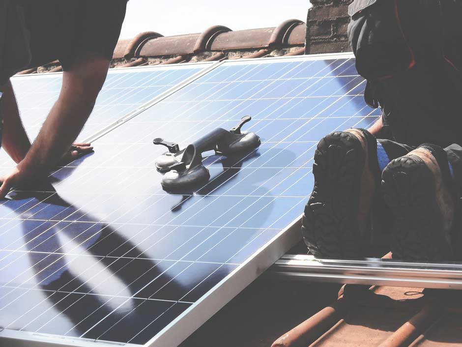 Installing solar panels on a sloped roof