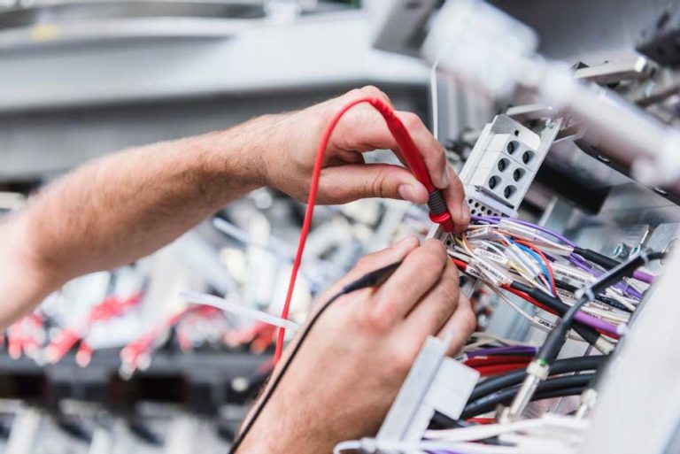 Electrician checking wiring