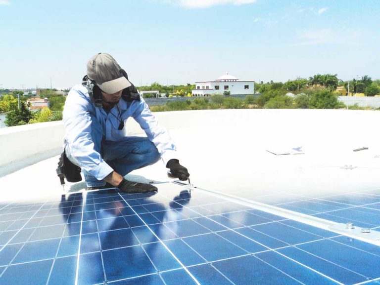 Installing solar panels on a roof